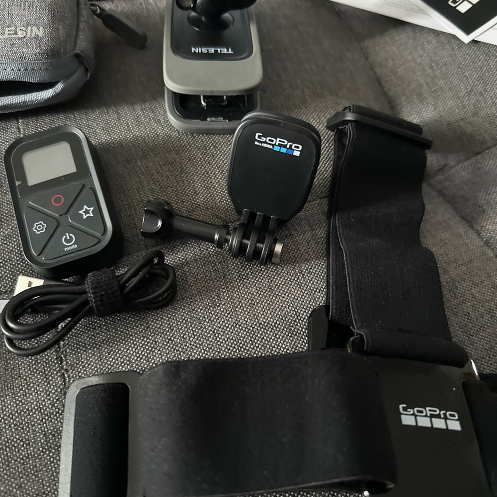 Go Pro 11 black camera with 12 piece accessories. - Picture 8 of 12